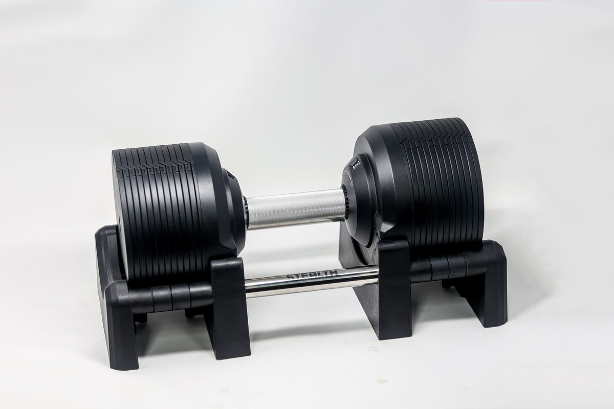 Mancuerna ajustable Black Edition de 41,5 kg en su base, vista lateral